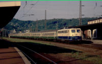 110 135 am 03.07.1994 mit Nahverkehrszug in Wuppertal-Steinbeck