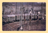 E 40 mit Personenzug am 17.04.1977 in Wuppertal-Langerfeld