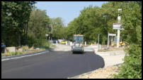 12.08.2020 - Die erste Asphaltschicht wird eingebaut.