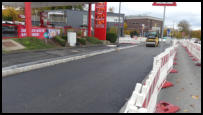 26.10.2020 - Die zweite Asphaltschicht wird eingebaut.