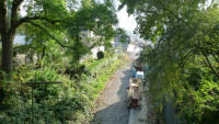 Blick vom Tunnelausgand an  der Rdiger Strae zum Haltepunkt Rott.